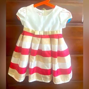Cream, red and gold striped toddler holiday dress. Very sweet!